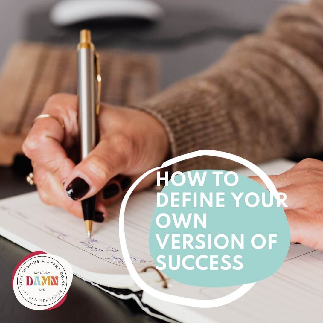 A woman writing in a journal with a blue circle and the words How to define your own version of success